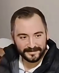 Siyah montlu adam